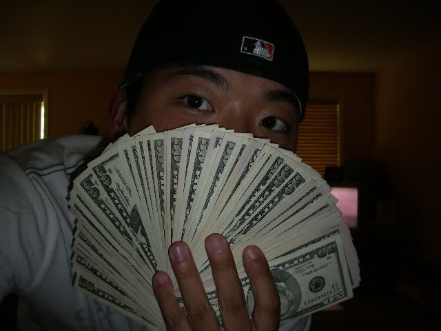 http://i40.photobucket.com/albums/e204/johnnylude/moneypics008.jpg