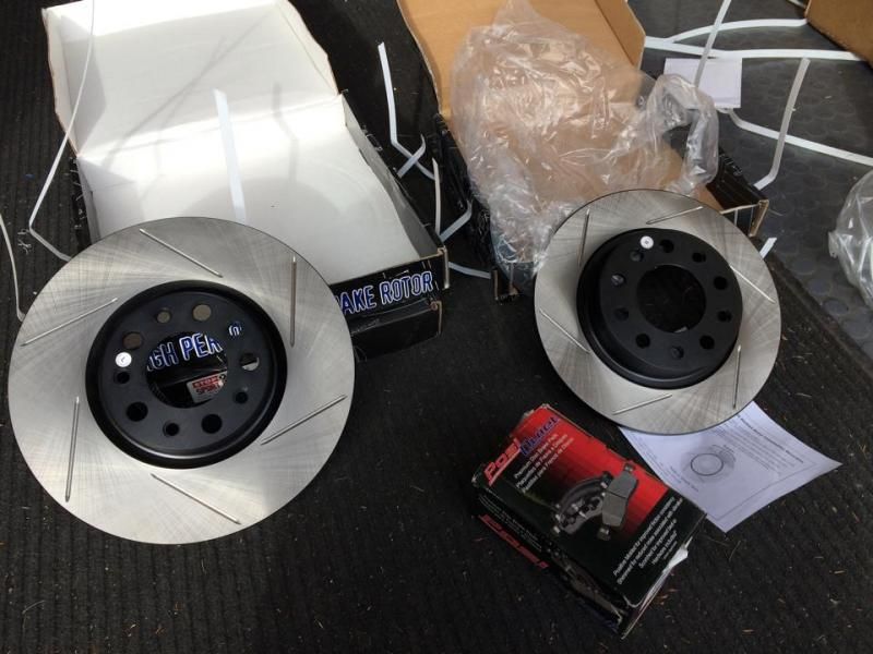 WOOT! Stoptech Slotted Rotors arrived from tire rack Dodge Dart Forum