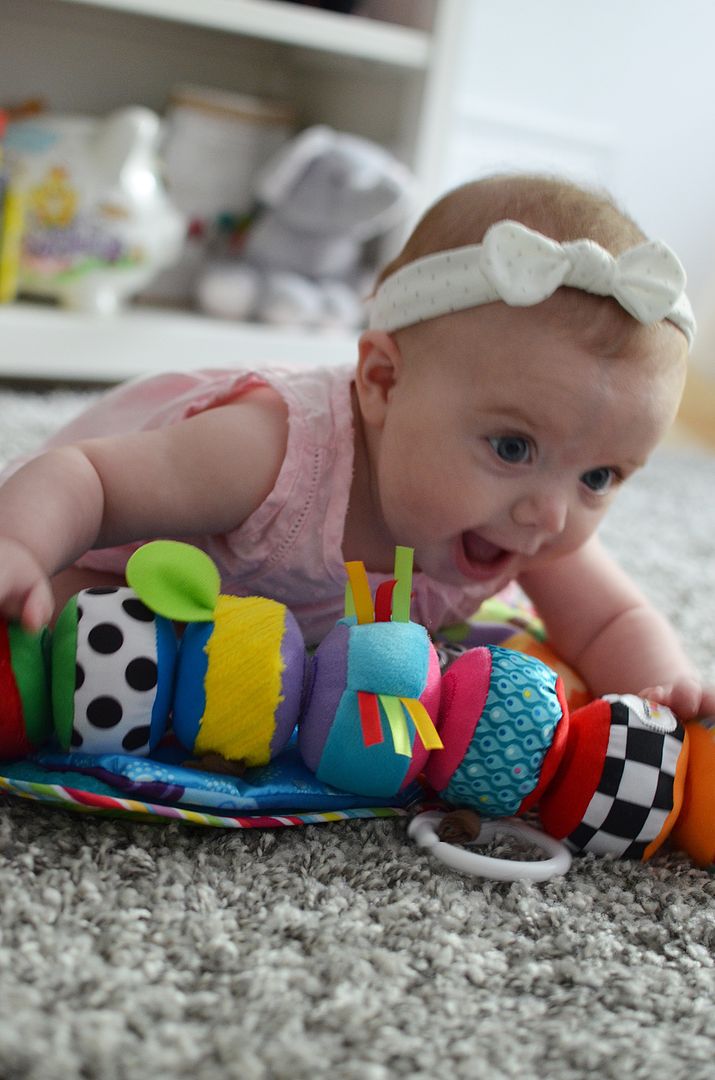Lila plays and learns with Lamaze toys