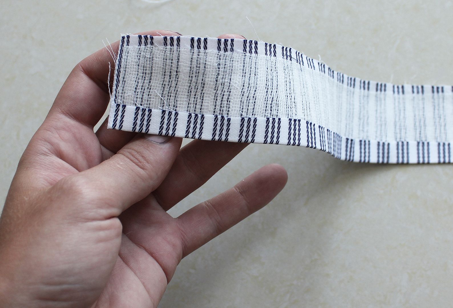 photo 2.5 Press long edge of lower collar piece_zpsuy82w6yj.jpg