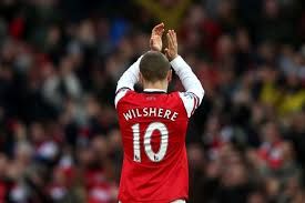http://i40.photobucket.com/albums/e232/karsene/wilshere.jpg?t=1376646952