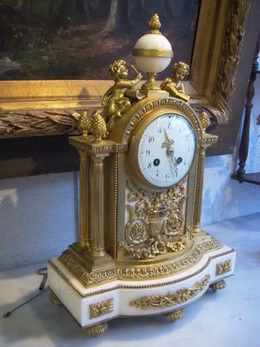 Antiquites Authier Perigueux : Pendule et 2 candelabres Putti bronze dore fin 19eme