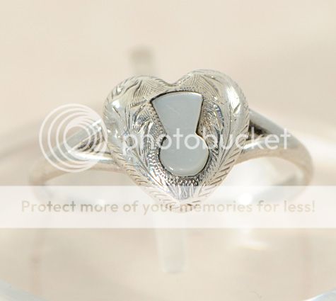 mother of pearl set Key To My Heart ring dating to the Edwardian 