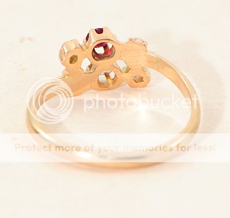 diamond, ruby and pearl ring made in 14 carat rose gold and dating 