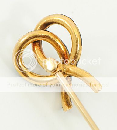 diamond and enamel decorated bow hat pin made in 18 carat gold with 